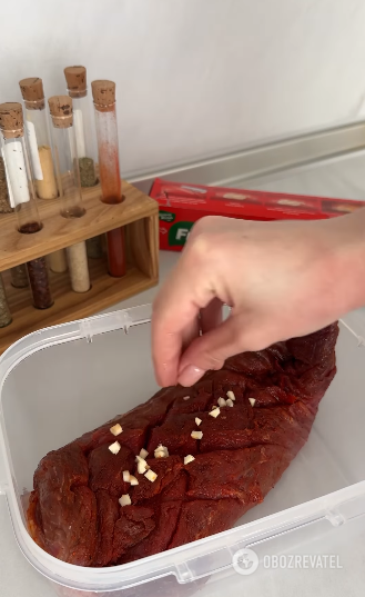 Meat in cranberry sauce in a baking sleeve: an easy recipe
