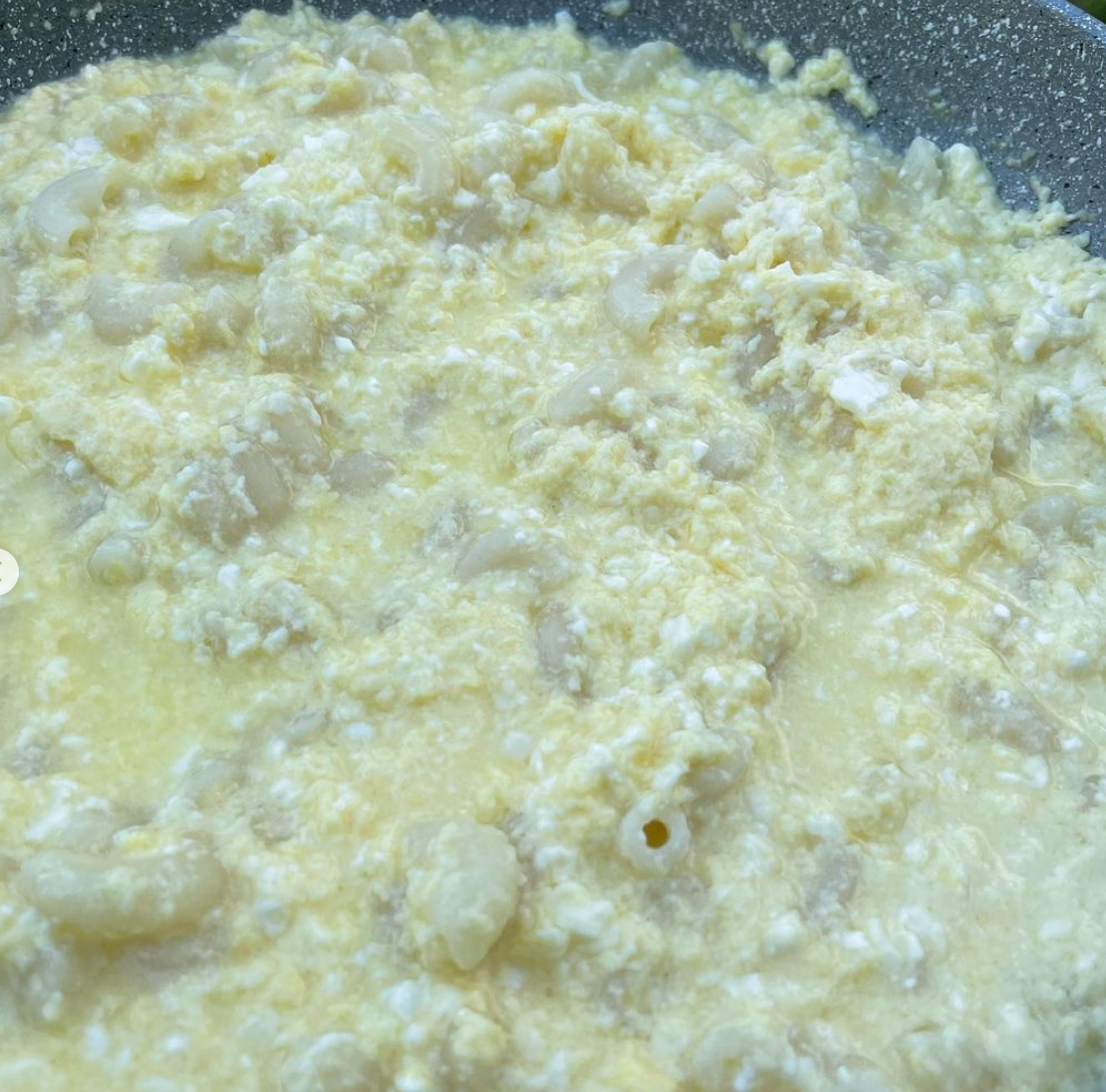 Mix cottage cheese, sour cream, and eggs.