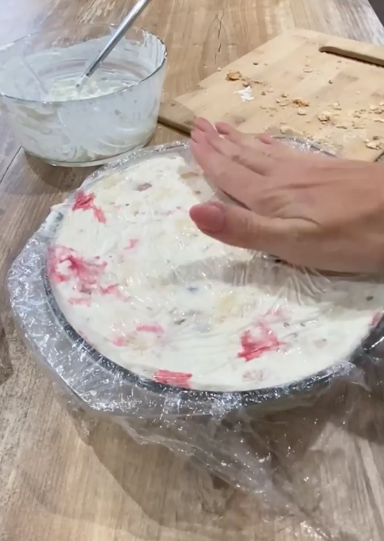 Cooking a cake with cherries
