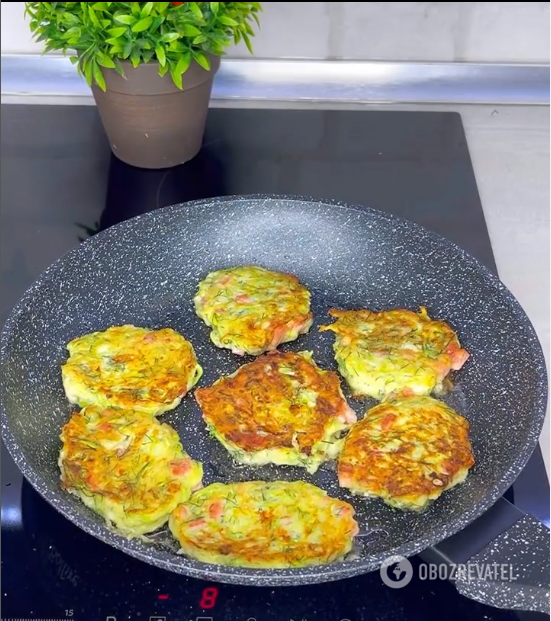 Zucchini pancakes with a secret: what to add to make the dish more delicious