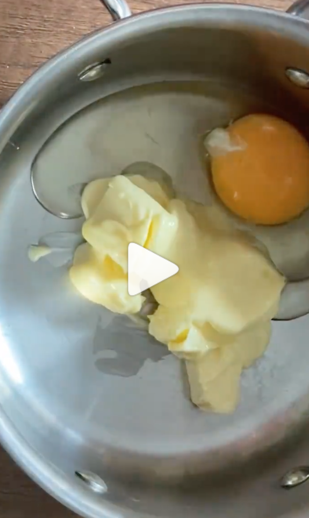 Butter with eggs for the dish