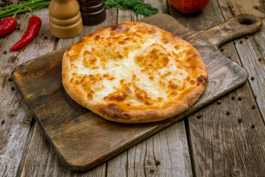 Low-calorie khachapuri with cheese in a pan