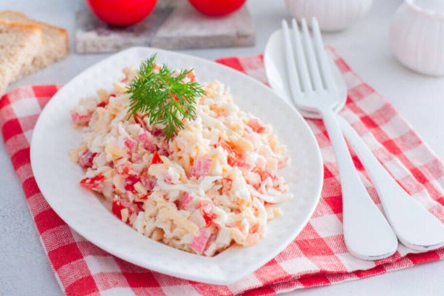 Mayonnaise salad with crab sticks and eggs