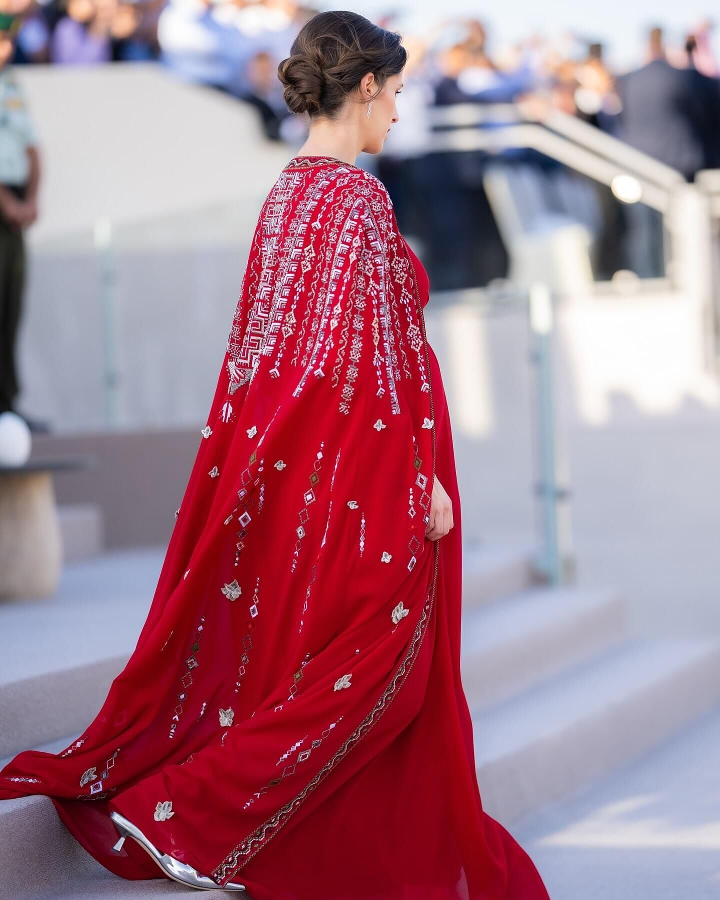 Pregnant Princess Rajwa of Jordan makes a public appearance in her new status for the first time: the stunning red dress was made to order