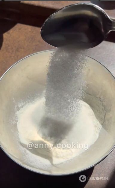 Adding salt and sugar to flour