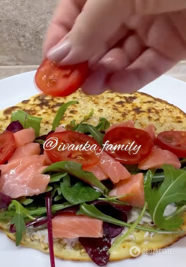 Healthy oatmeal pancake with fish and herbs