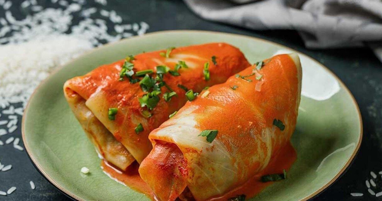 Cabbage rolls with minced meat, potatoes and tomato sauce