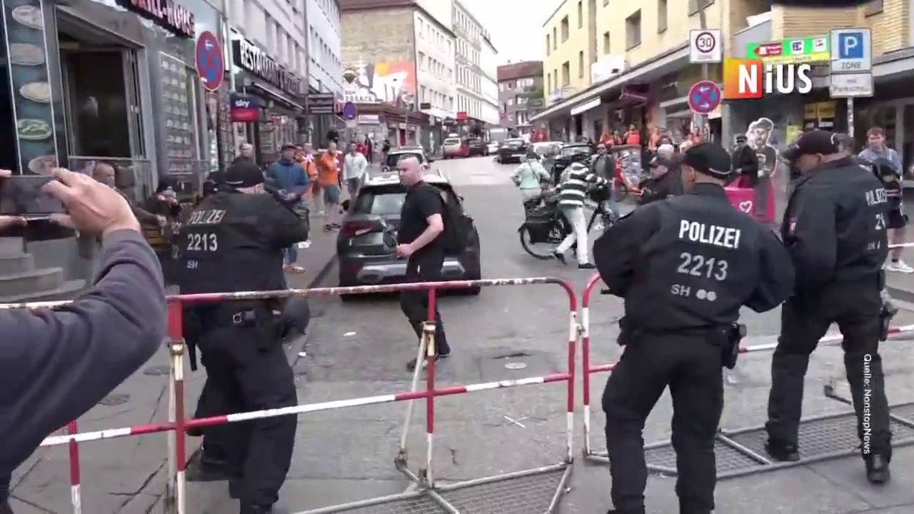 In Germany, police opened fire on a man armed with an axe during a Euro 2024 fan march. The moment was caught on video