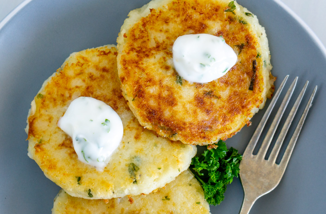 Delicious potato pancakes with sour cream