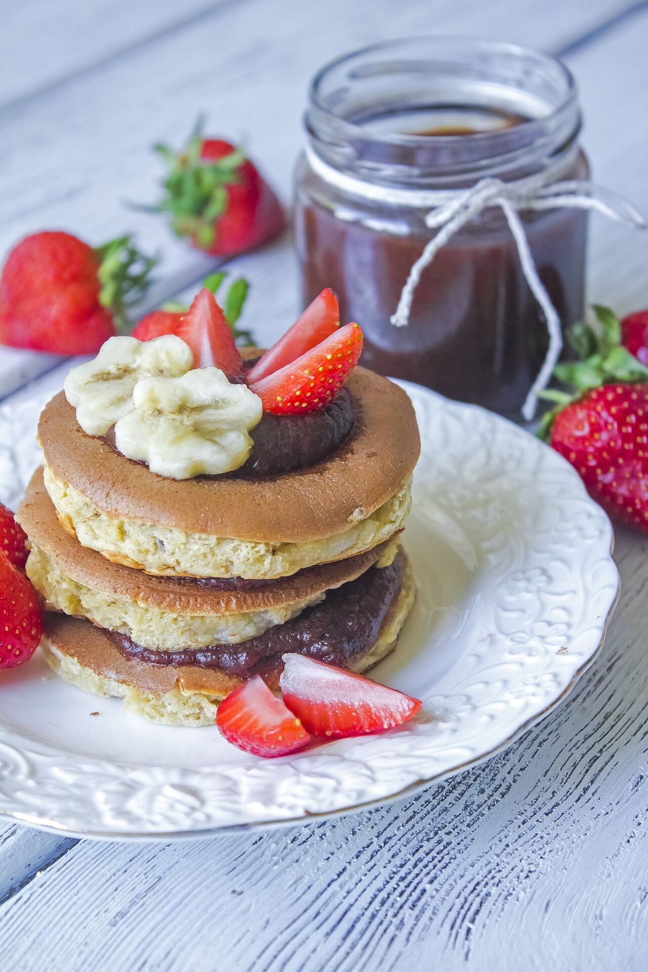 Banana pancakes with strawberries