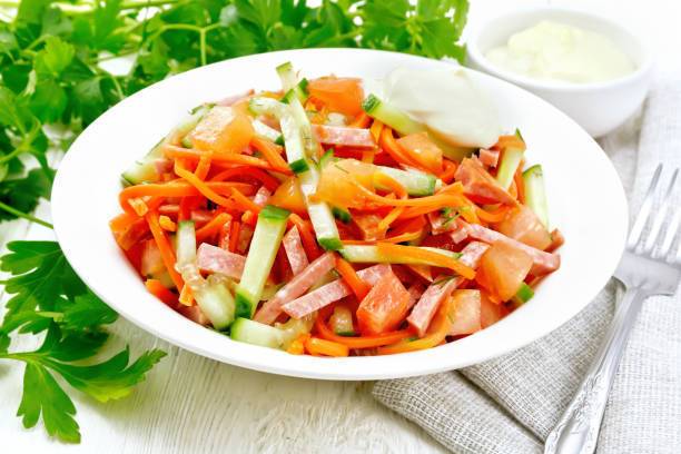 Salad with sausage and carrots