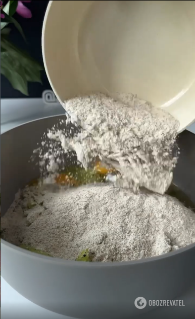 Adding flour to zucchini