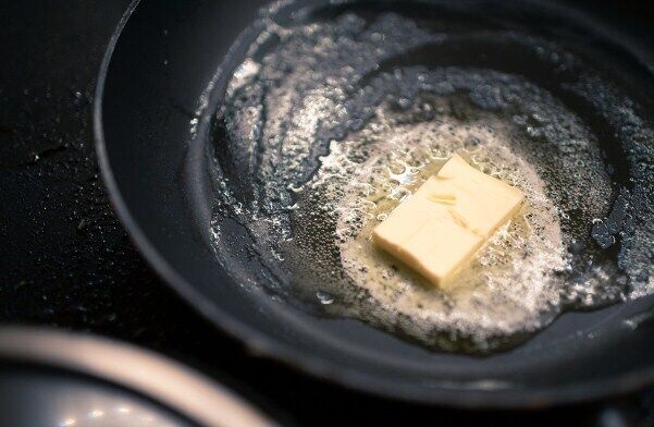 Fry the eggs in butter in a well-heated pan