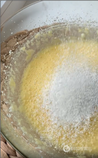 Adding flour to the dough