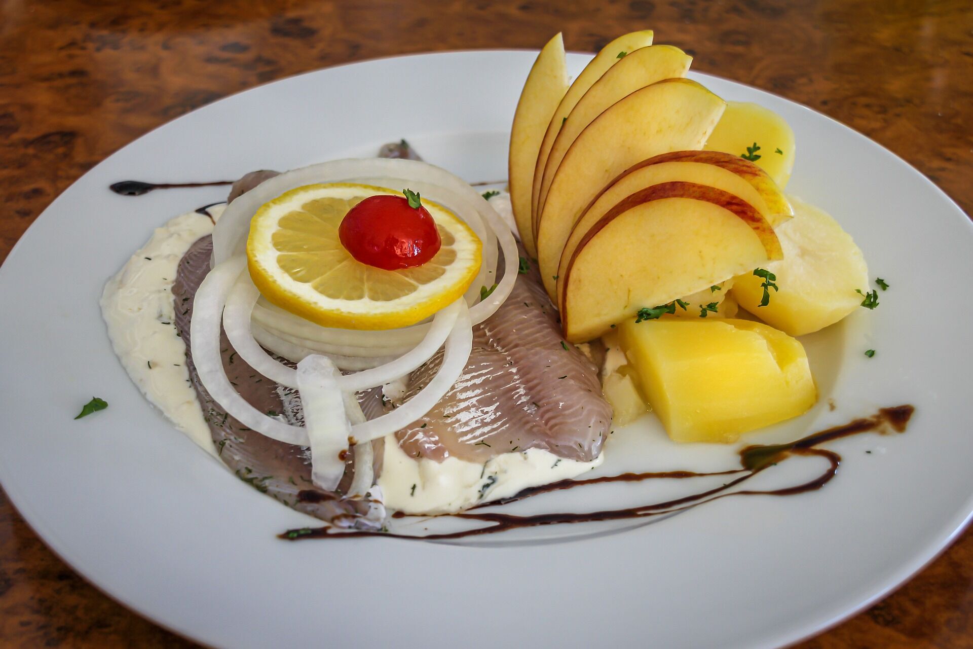 A dish with pickled herring