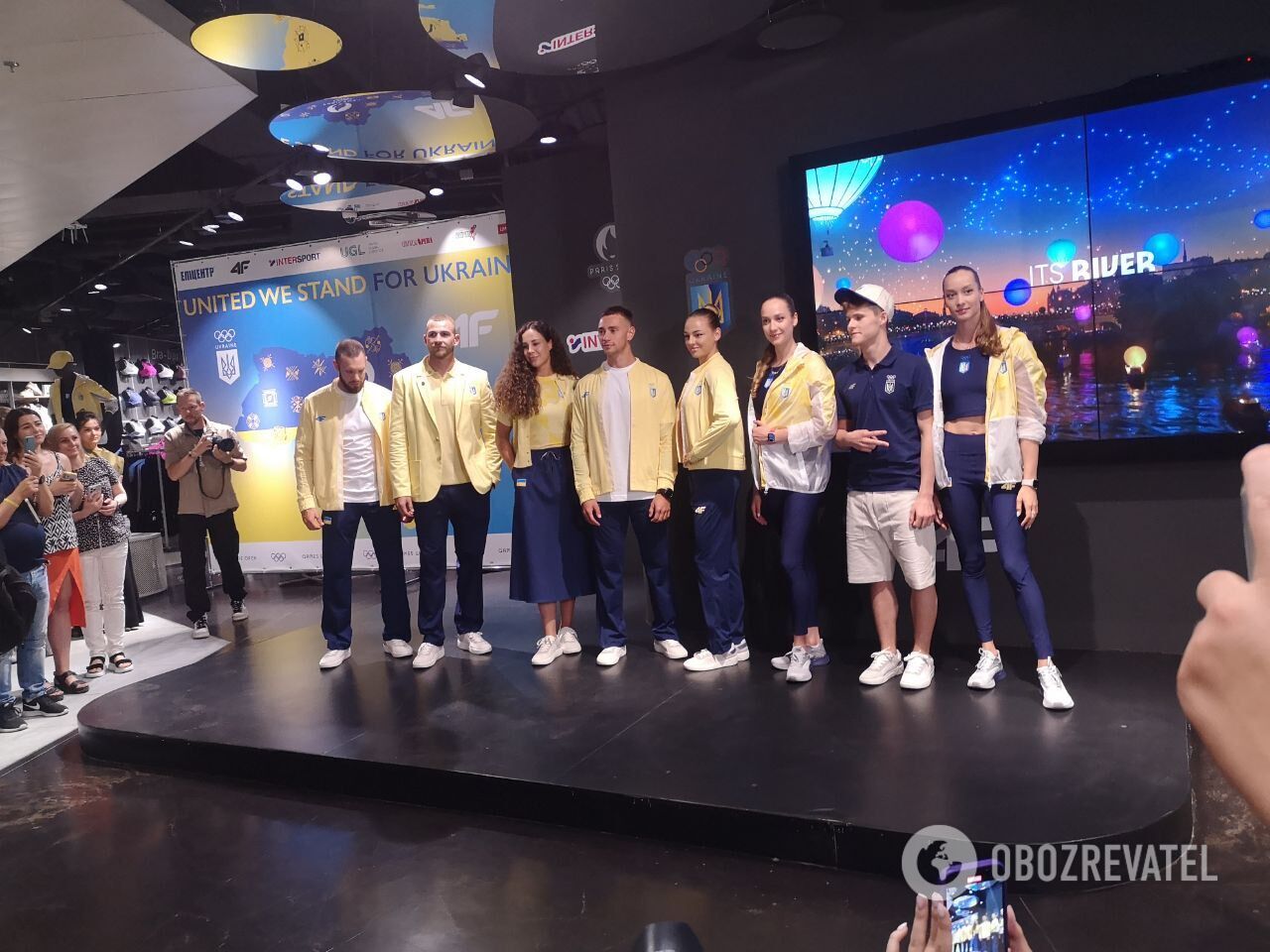 Ukrainian athletes show the uniform they will wear at the 2024 Olympics. Photo