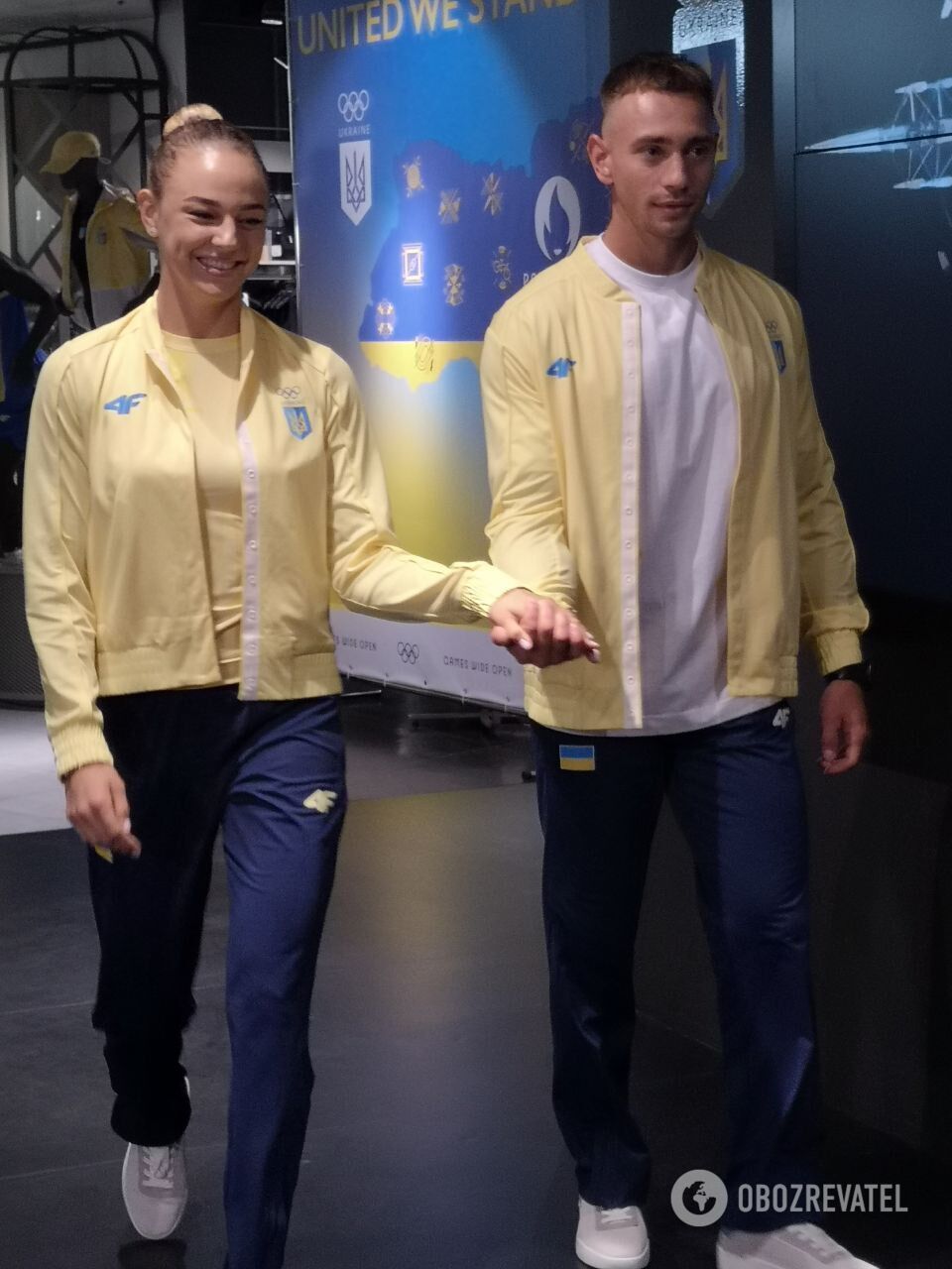 Ukrainian athletes show the uniform they will wear at the 2024 Olympics. Photo