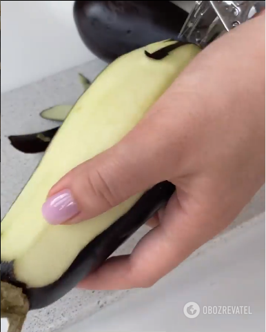 Peeling eggplants for a dish