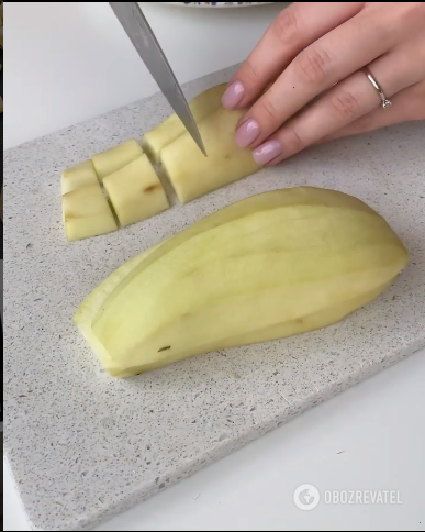 Slicing eggplant for a dish