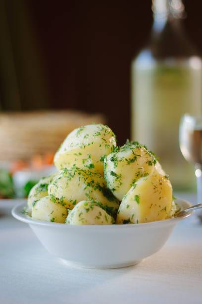 Young potatoes with dill and butter