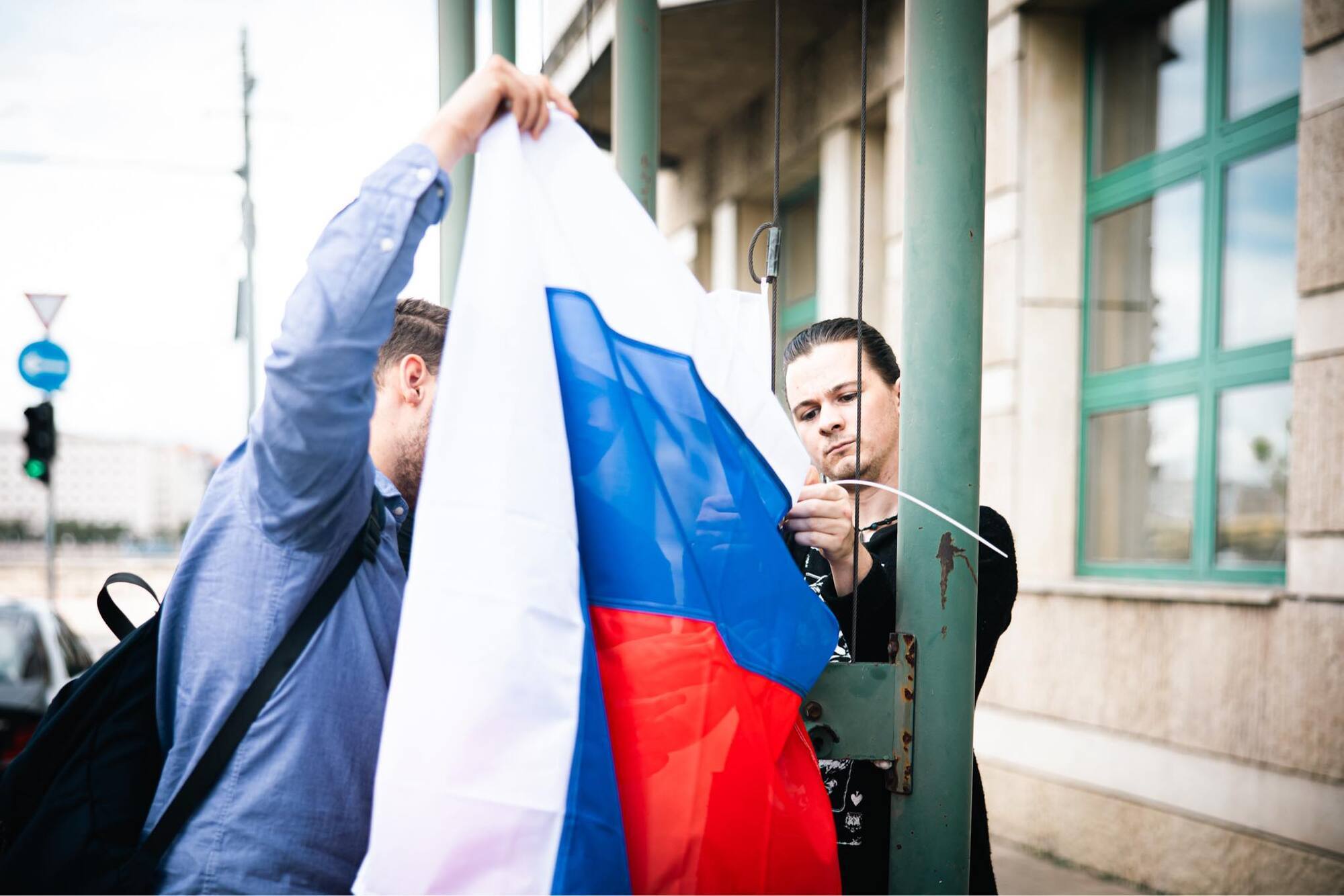 Activists place Russian flag outside the Hungarian Foreign Ministry to protest against Szijjarto's policy