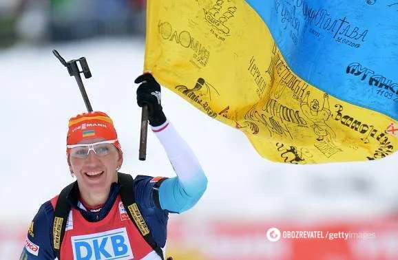 Olena Pidgrushna with the flag