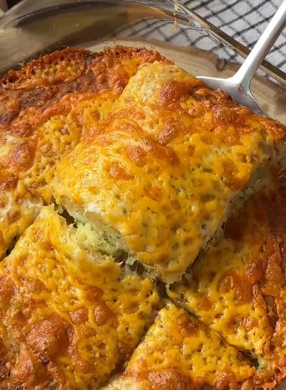 Hearty zucchini casserole with cheese for lunch: easy to prepare