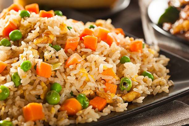 Rice with vegetables in a pan