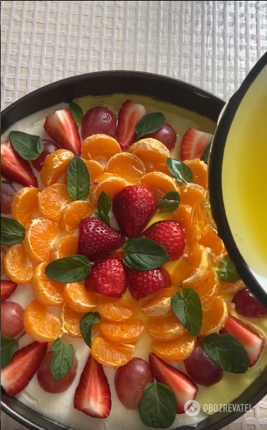 Pouring jelly on fruit