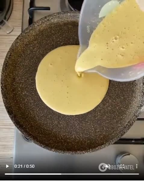 Pouring the pie batter into a pan.