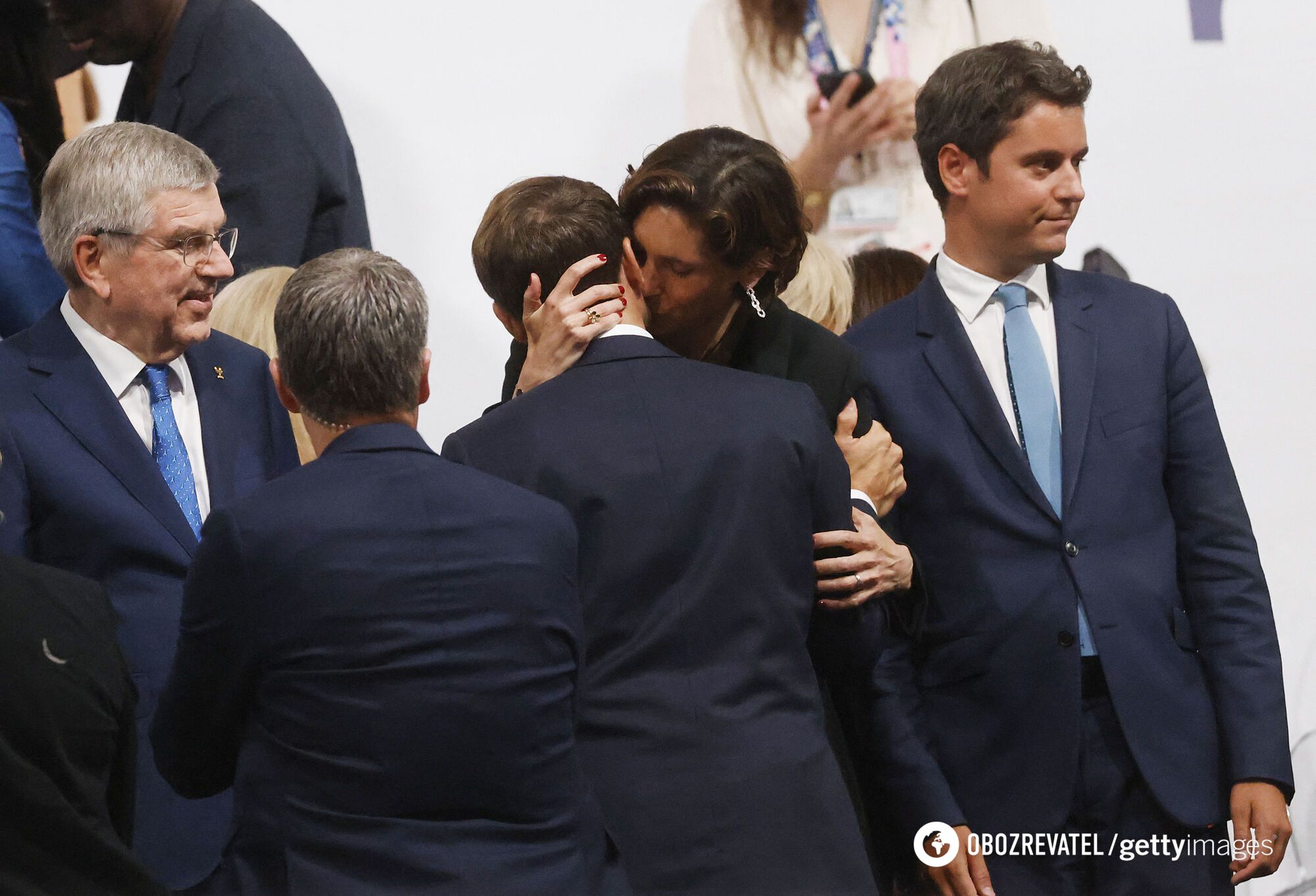 A photo of French President Emmanuel Macron and the Minister of Sports kissing went viral: his wife was standing nearby