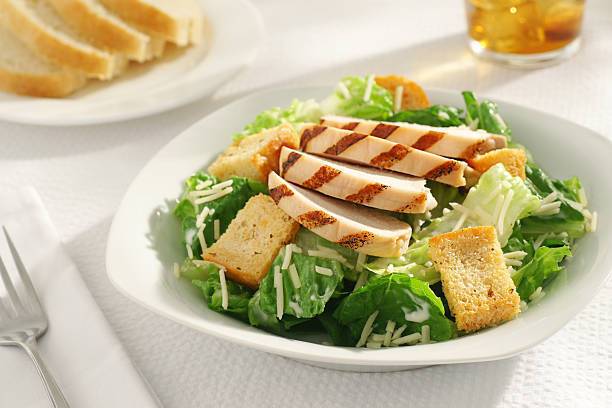 Salad with croutons and chicken