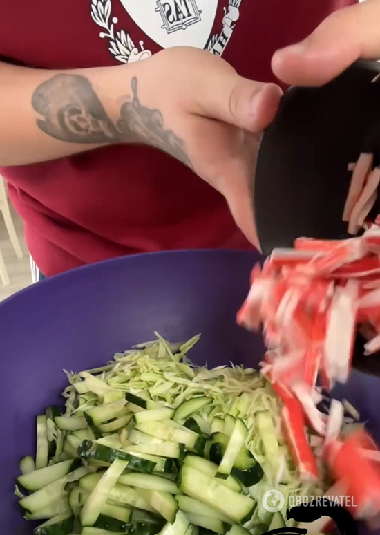 Summer crab salad: add lots of fresh vegetables and cheese