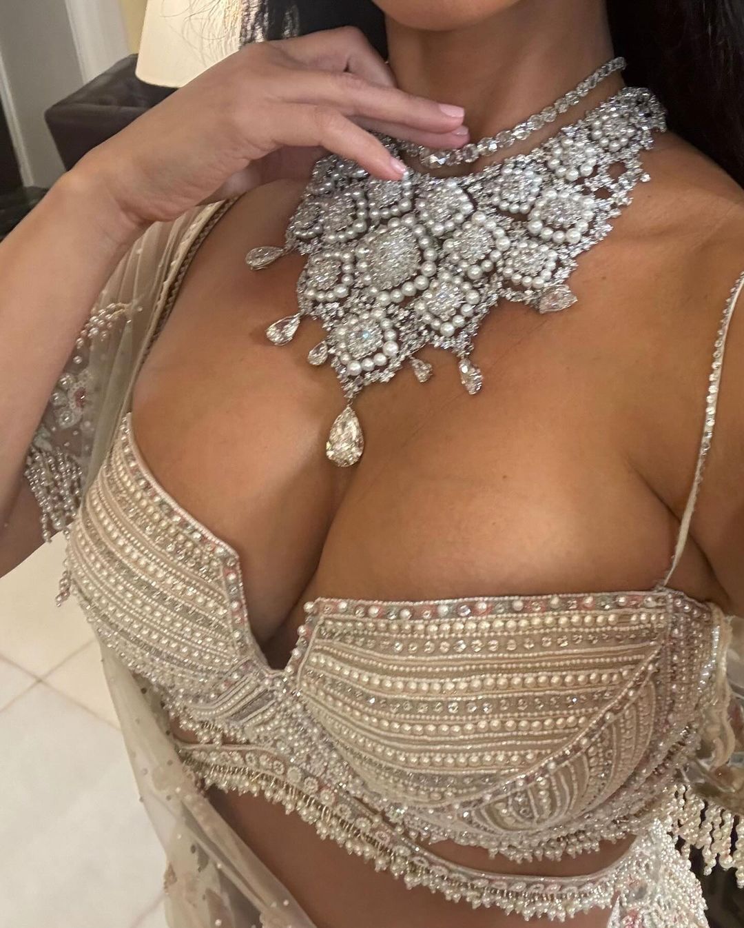 Kim Kardashian showed details of a luxurious diamond outfit for the Indian billionaires' ''wedding of the year''. Photo