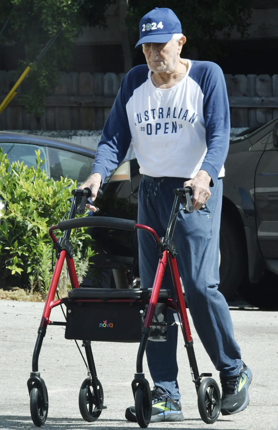 On a walker and with his ex-wife: ex-James Bond made his first public appearance after retirement. Photo