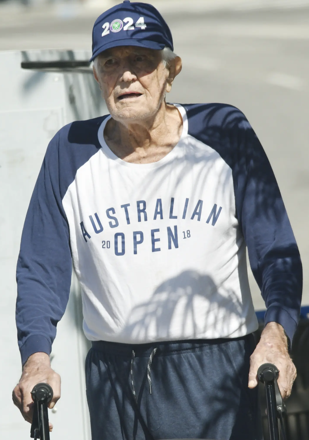 On a walker and with his ex-wife: ex-James Bond made his first public appearance after retirement. Photo