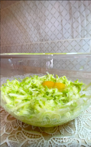 Grated zucchini for the dish.