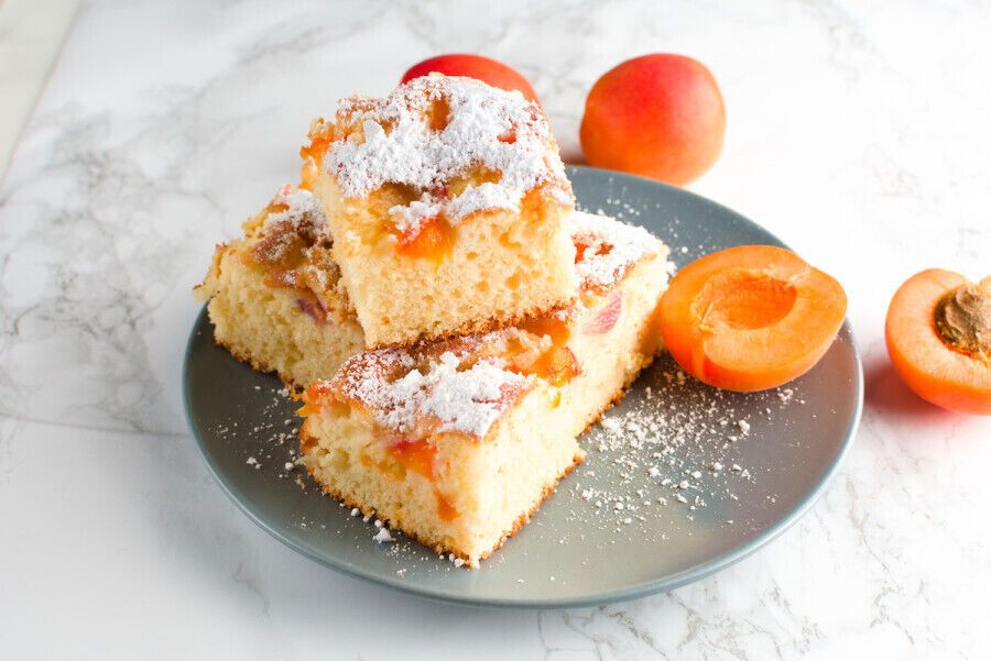 Lush sponge cake with apricots.