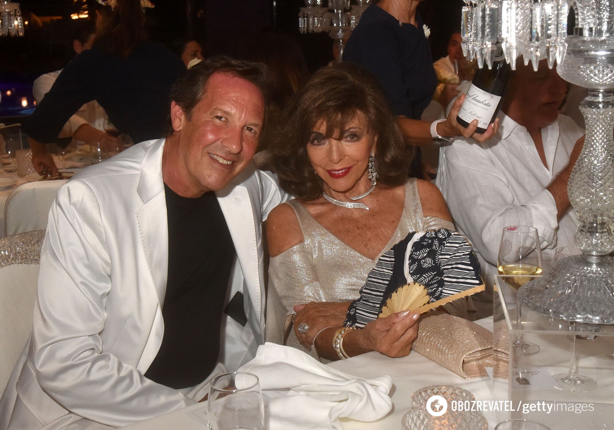 The ''Dynasty'' star went public in a daring dress: how 91-year-old Joan Collins looks, who charmed 32 years younger man. Photo