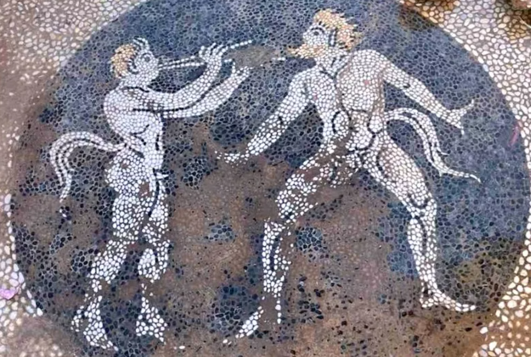 An ancient Greek mosaic depicting two nude men with tails has been unearthed in Greece. Photo