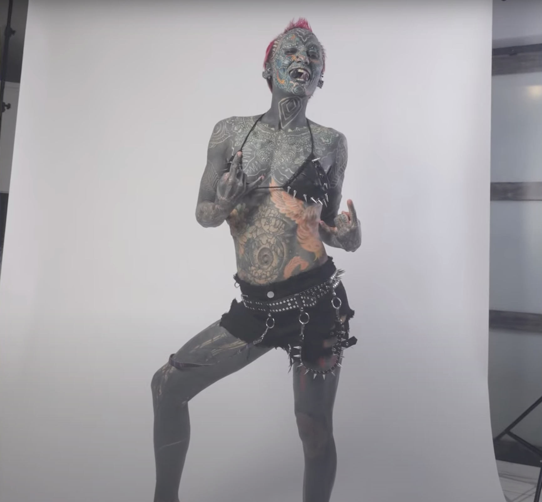 A woman whose body is 99.8% covered with tattoos has entered the Guinness Book of Records. Photos and video