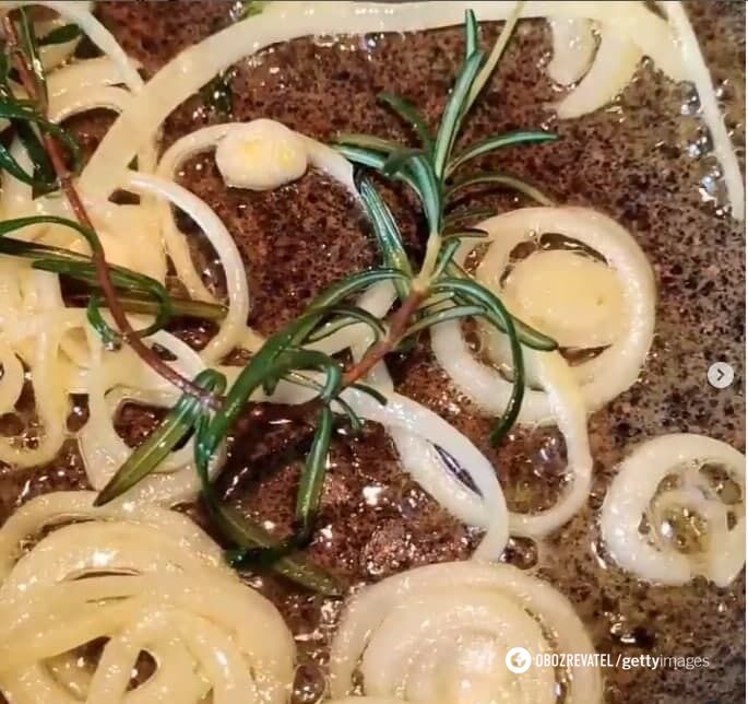 Frying onions with rosemary