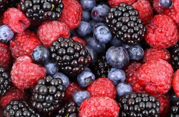 Jam with raspberries, jostaberries and blueberries.