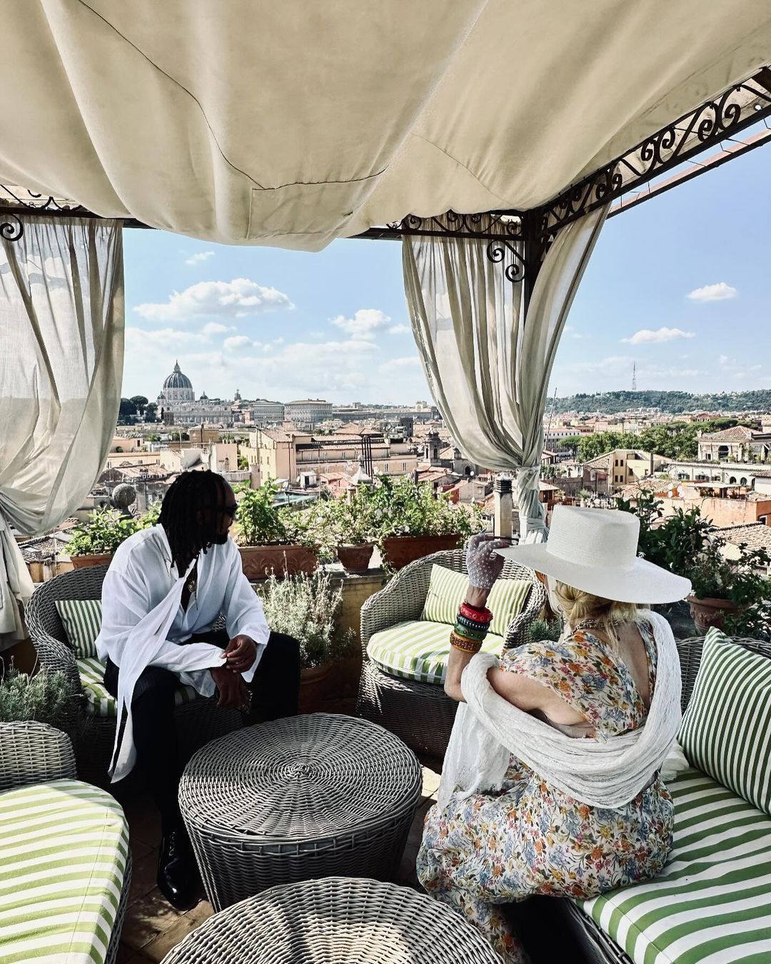 In a hat from a Ukrainian brand. Madonna showed new photos with her young boyfriend while on vacation in Rome