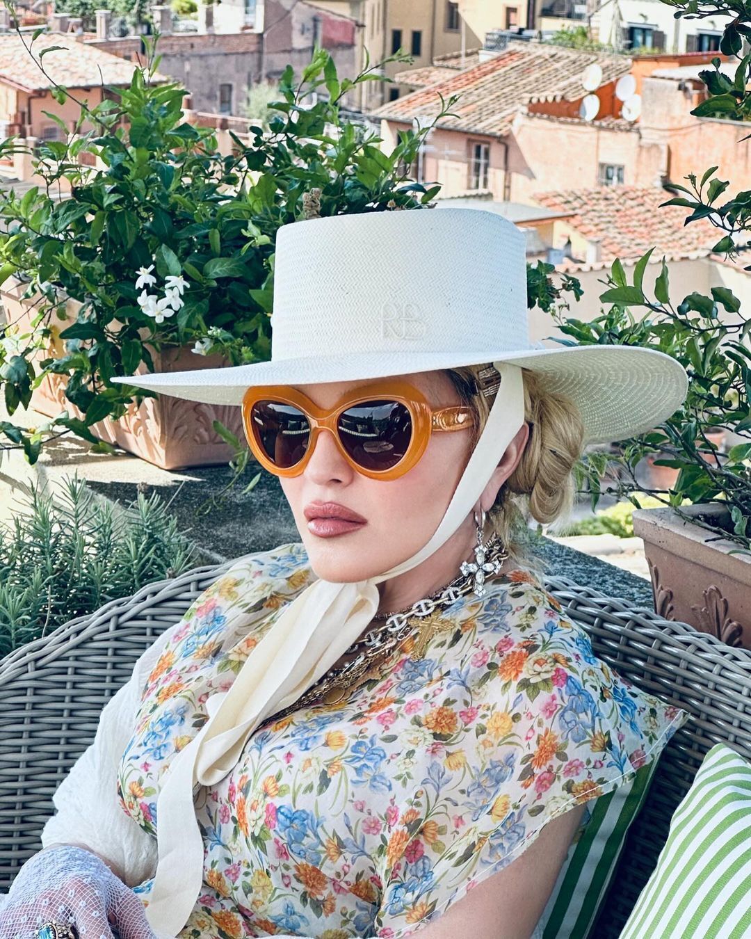 In a hat from a Ukrainian brand. Madonna showed new photos with her young boyfriend while on vacation in Rome