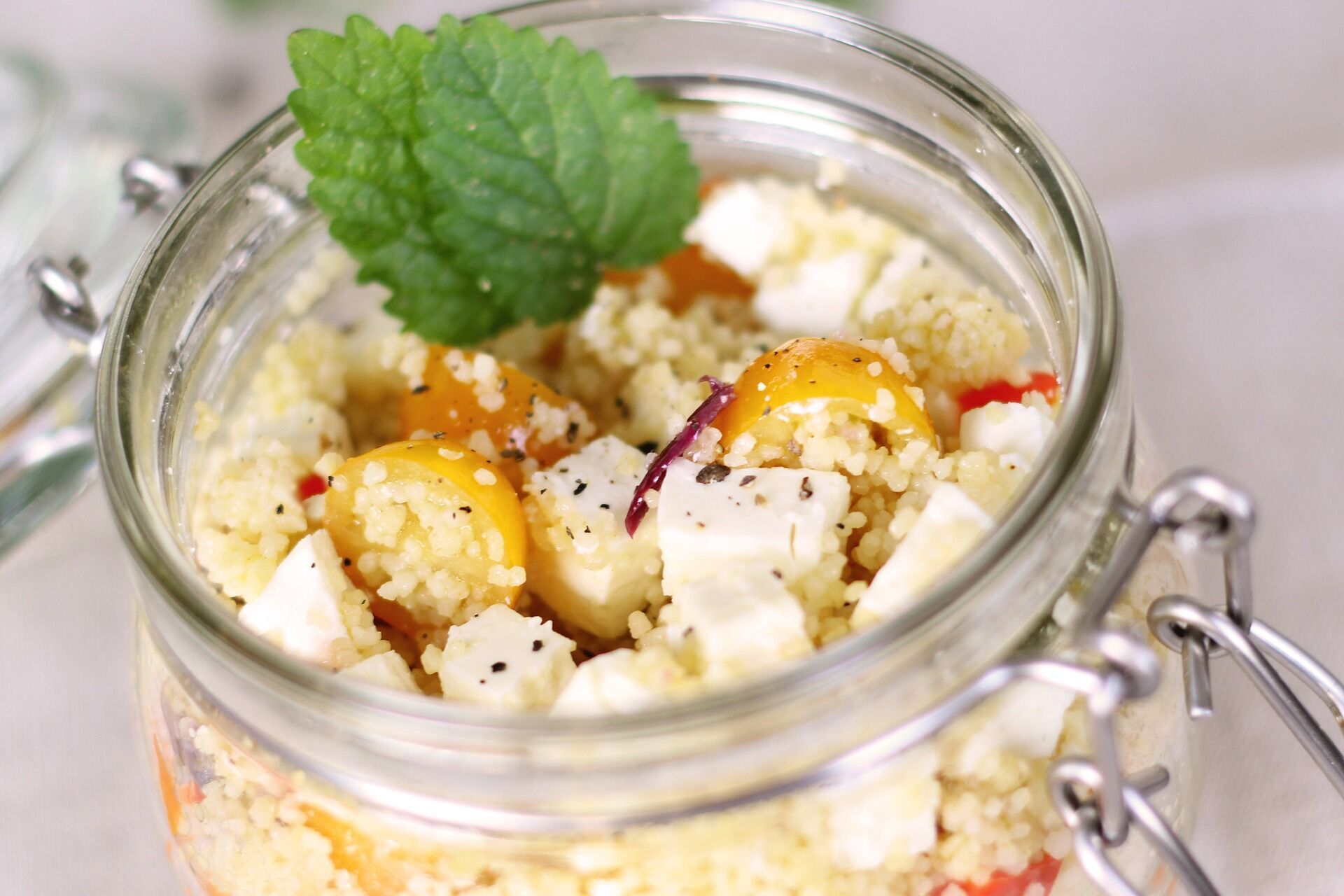 Uncooked couscous with vegetables and cheese