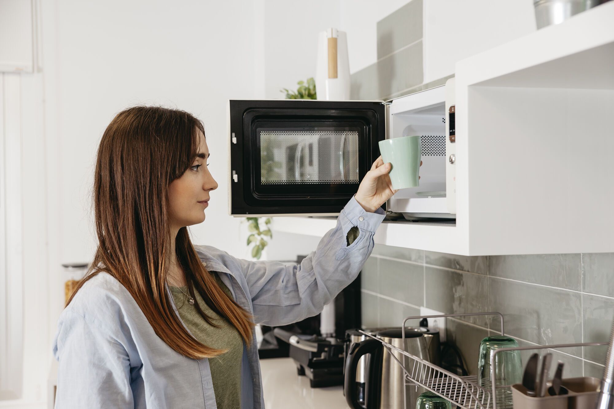 Where not to put a microwave in the kitchen: experts name the most unsuitable places