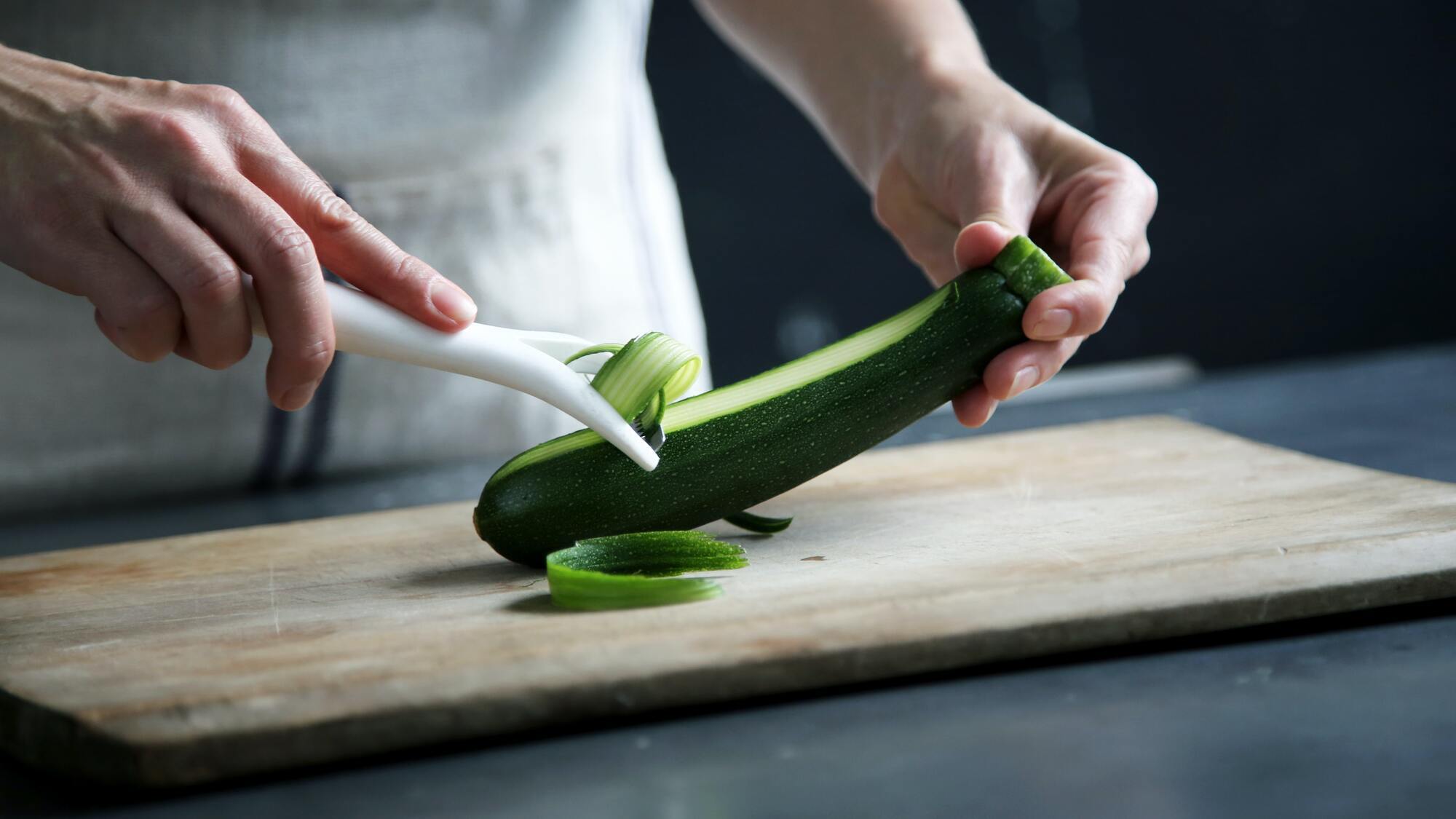 Slicing zucchini.