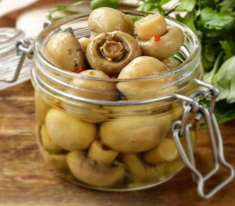 How to deliciously pickle champignons for the winter: a variant of a wonderful spicy appetizer for the festive table