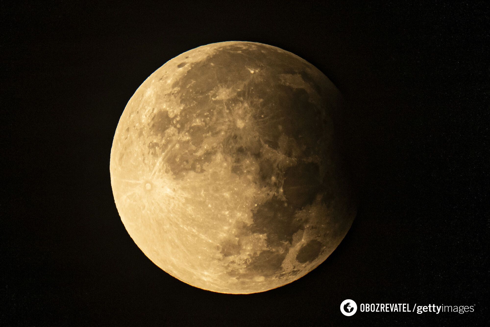 Harvest Supermoon covered by the Earth's shadow: a unique eclipse captured on camera. Photo